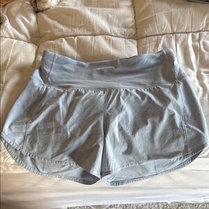 Lululemon Athletica mid rise speed up lines short 4 inch in BLUE LINEN
